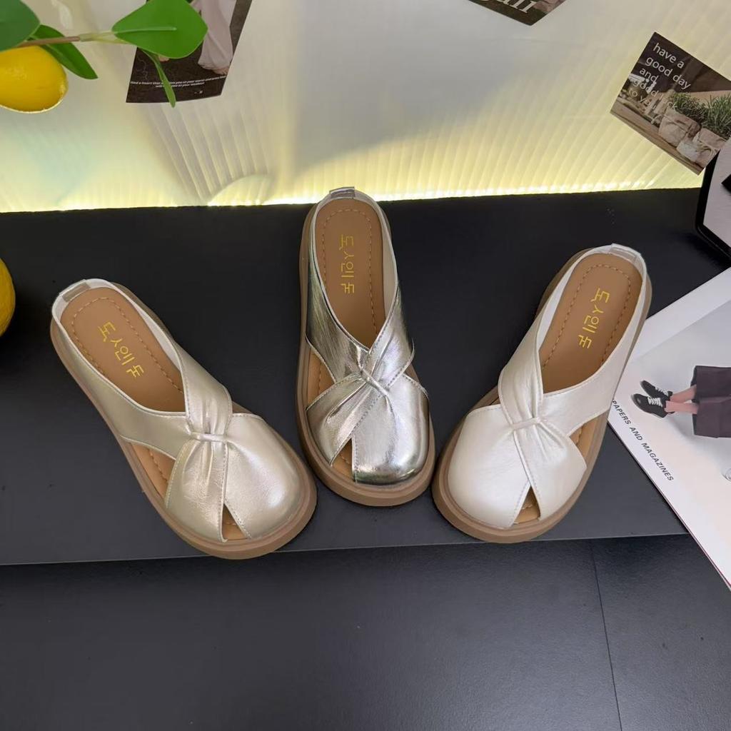 Baotou hollow slope heel half drag sandals women wear summer new French temperament flat bottom one word cool single shoes