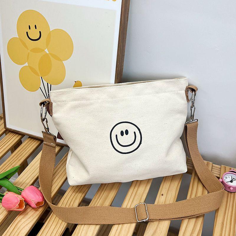

Canvas Bag for Women New Arrival Minimalist Fashion All-Match Small Cloth Bag Work Commuter Bag Artsy Smiley Face Shoulder Messenger Bag Mi Bai Smiling Face
