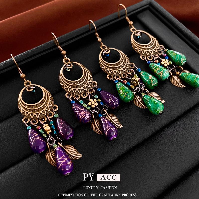 

Серьги с кисточками в богемном цветочном стиле, ушные крючки в ретро-нише в этническом стиле, модные и универсальные серьги высокого класса.