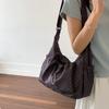 Korean Style Artistic Polka Dot Drawstring Pleated One-Shoulder Crossbody Bag for Women - Large Capacity, Portable, and Perfect for Commutes.