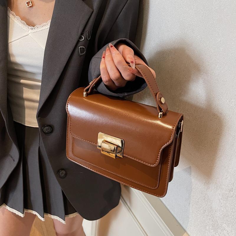 Torby damskie wiosna i lato nowe modne małe kwadratowe torby spersonalizowane eleganckie torby na ramię retro modne listonoszki