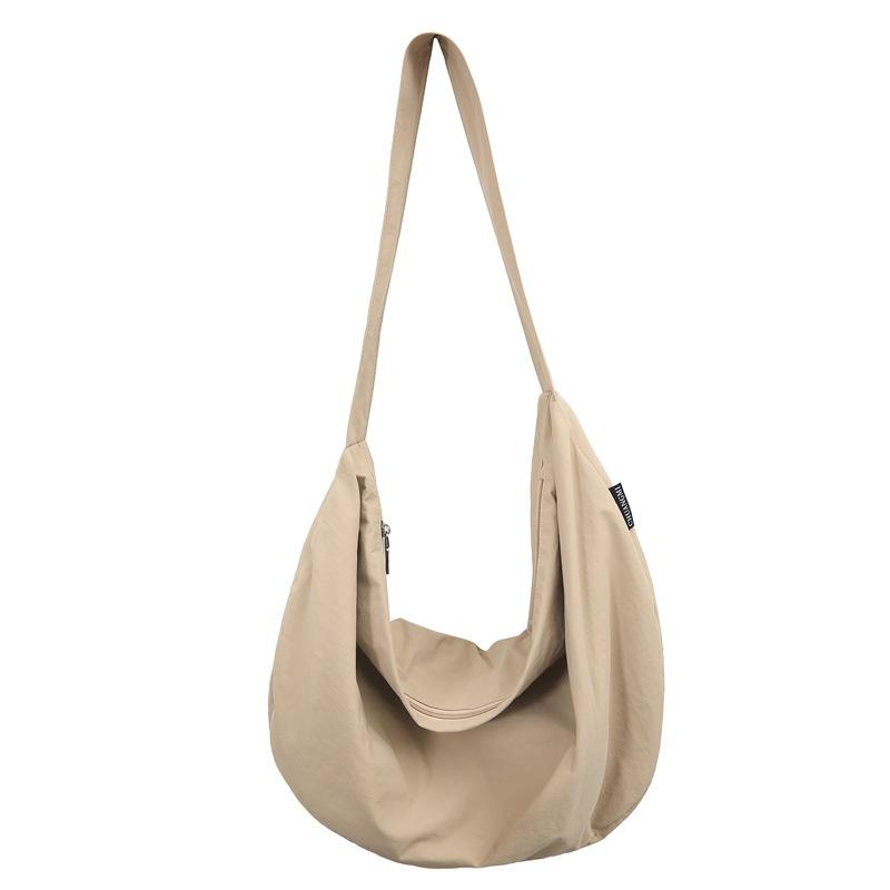 Large Capacity Fashion Dumpling Bag Women's Japanese 2025 Summer New Simple Shoulder Bag Niche Design Messenger Bag