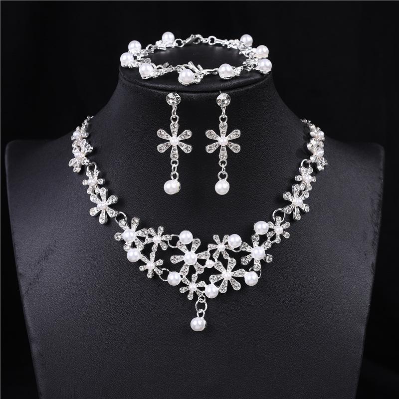 Elegant Pearl and Crystal Jewelry Set: Necklace, Earrings, & Bracelet for Brides