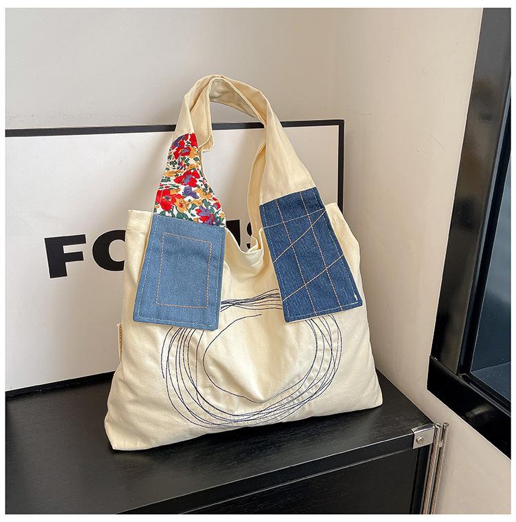 

Embroidered canvas bag women s large-capacity new summer versatile casual shoulder bag college student tote bag брудно-білий