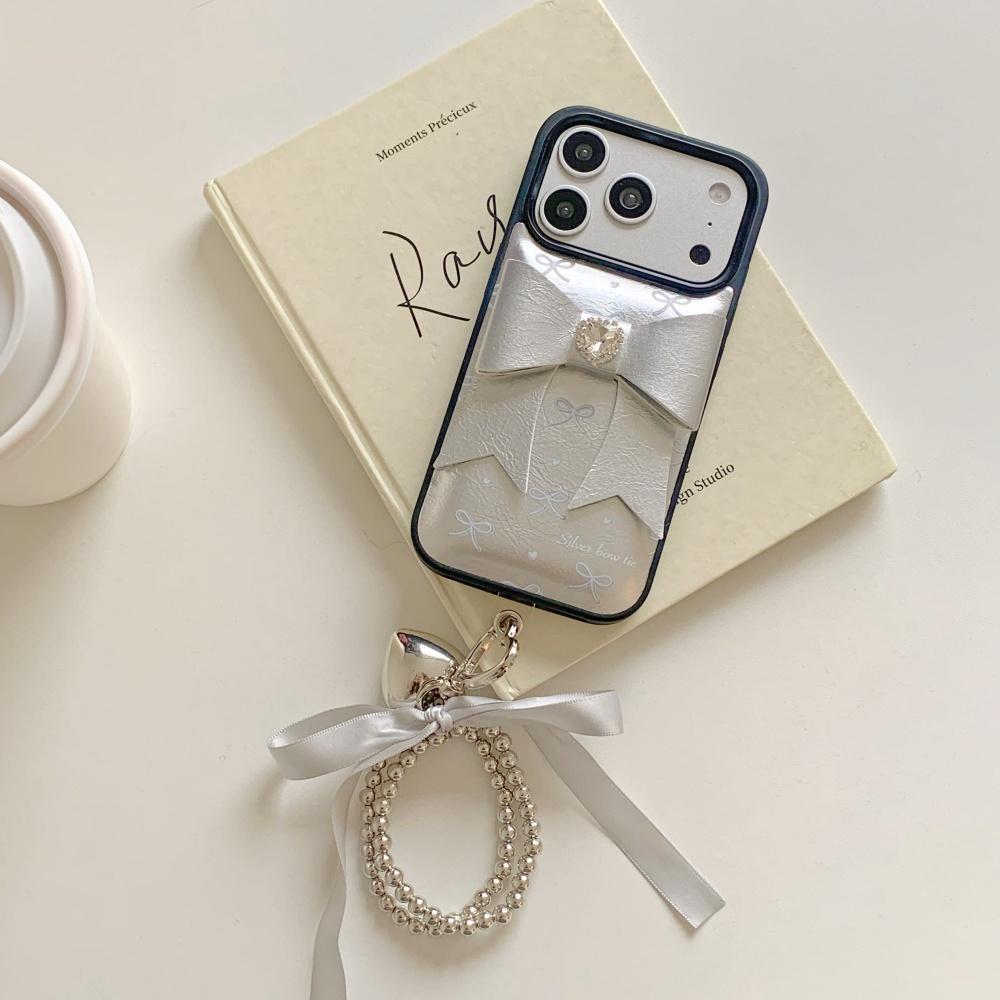 Korean ins silver leather three-dimensional bow, suitable for Apple 17 mobile phone case, new iPhone17promax high value 15 trend 14 flash diamond 13