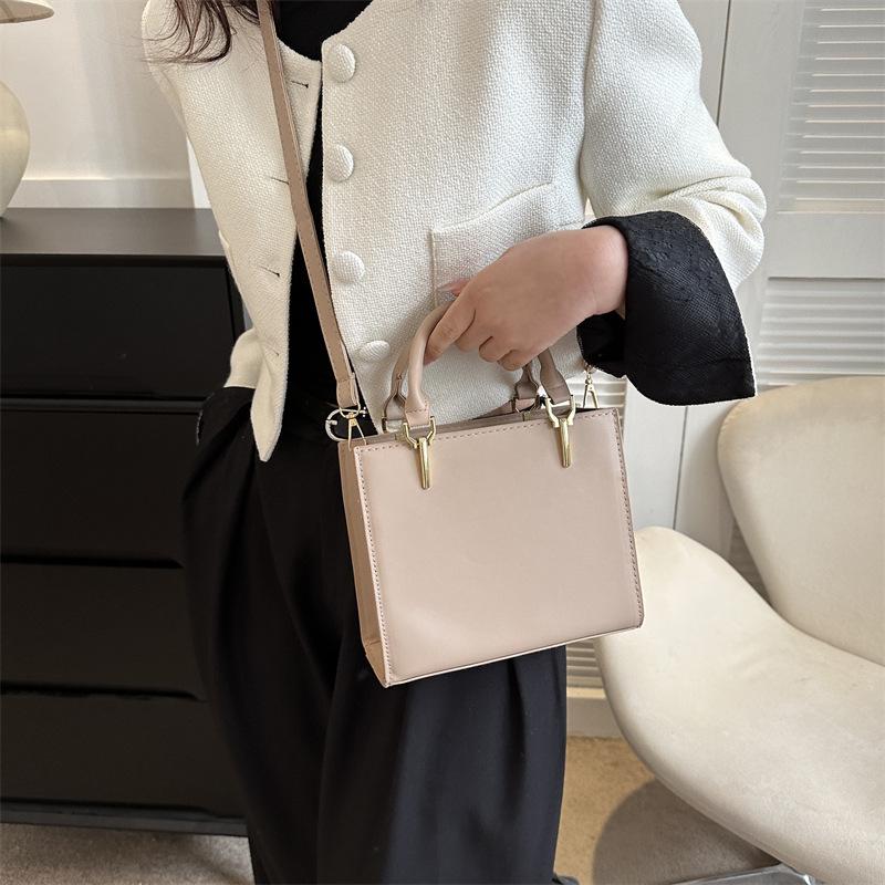 2024 Spring Women's Minimalist Crossbody Shoulder Bag - High-Quality, Fashionable, Versatile Handbag with Unique Stitching.