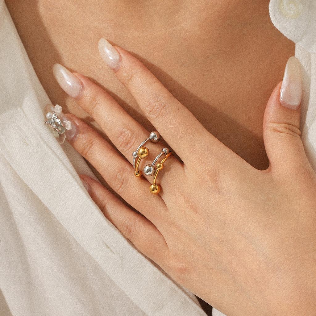 Gold- und silberfarbener Color-Block-Ring mit großen und kleinen Kugeln, zweilagig, leichter Luxus, Nischen-Design, Titanstahlring