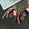 Cross-Border MIU Series: Alkali Water Bread Bag Pendant - Bagel Chocolate Climbing Rope Keychain Decor