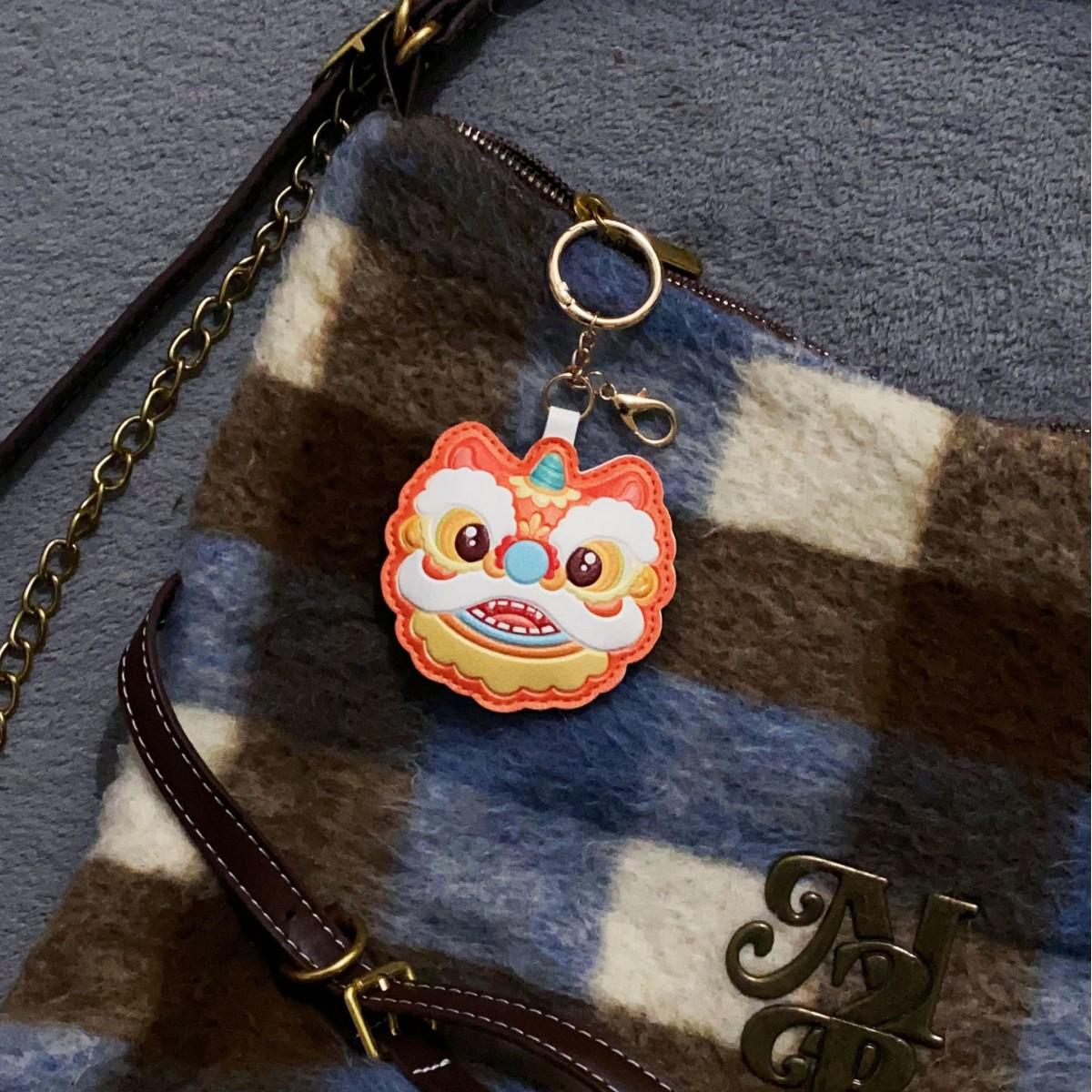 

Guochao Lion Keychain: Creative PU Leather Pendant, Cute Cultural Backpack Accessory for Good Luck Gifts помаранчевий