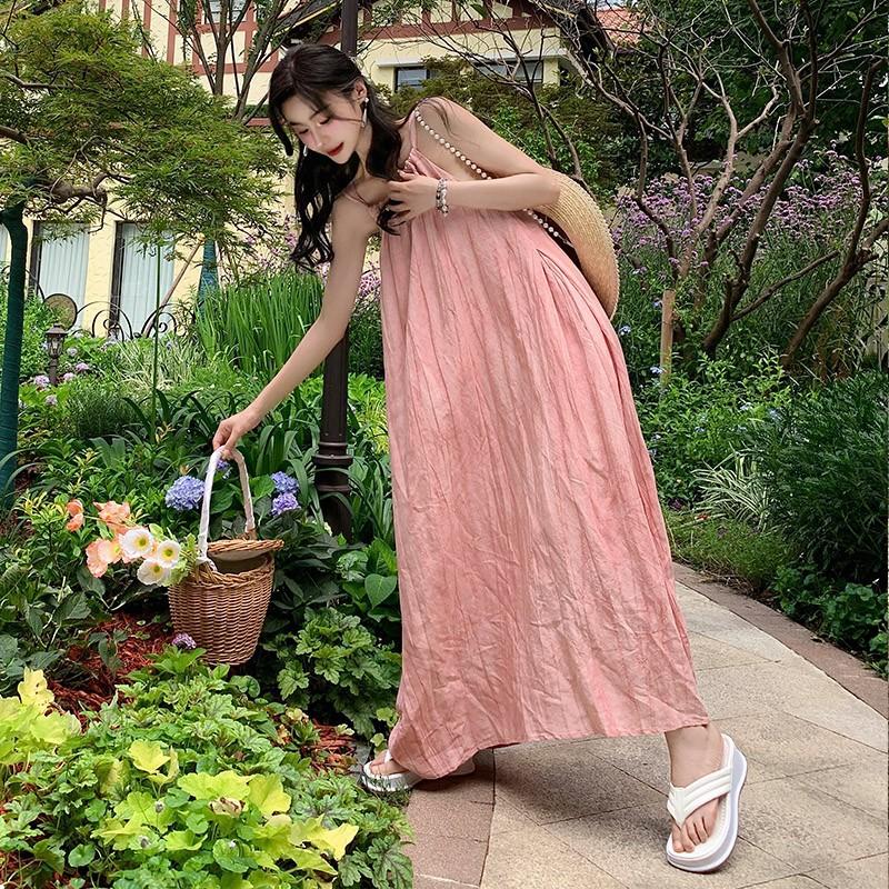 Lazy vacation beach dress pink sleeveless neck dress summer 2026 new super fairy seaside photo skirt