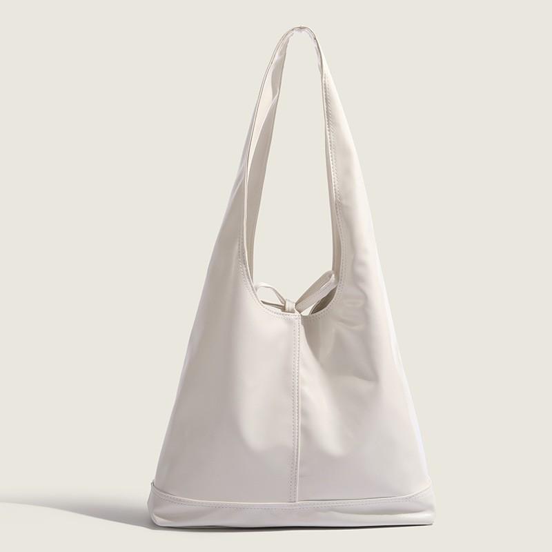 

Commuting Large-capacity Shoulder Bag South Korea Niche New Triangular Tote 2026 Casual Underarm Women