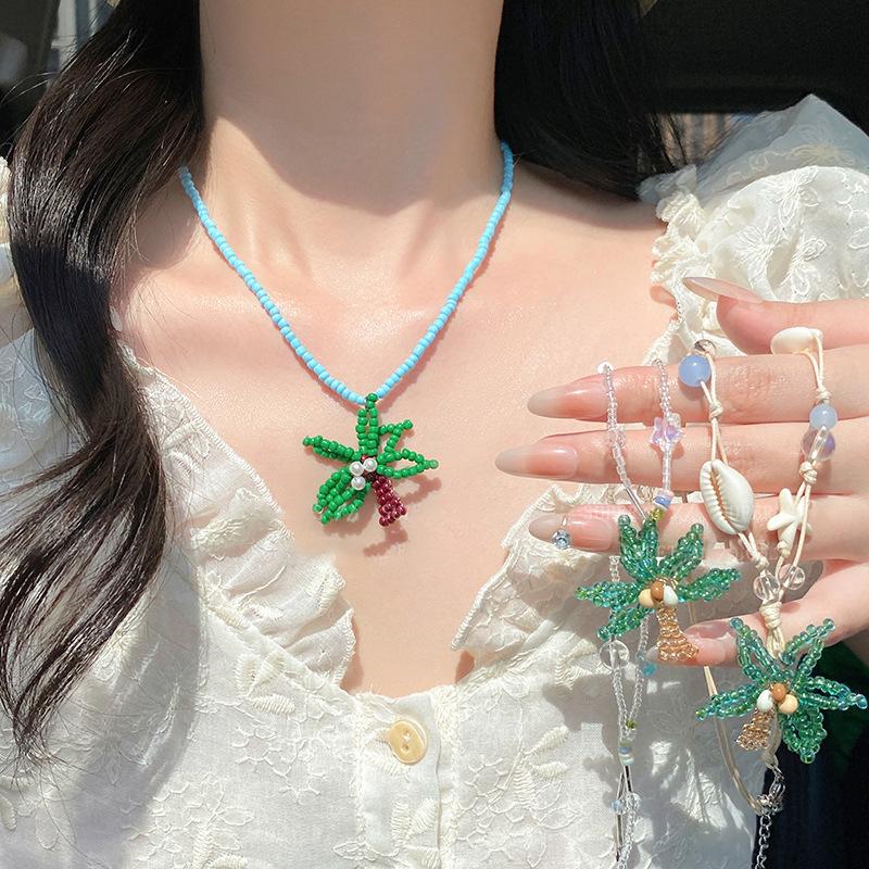 

Titanium steel glass beads rice beads coconut tree pendant necklace unique design collarbone chain niche fashion item jewelry women