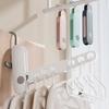 Xin Zao Portable Travel Clothes Hanger - Multi-functional Folding Rack with Seven Drying Holes for Hotel and Business Trips.