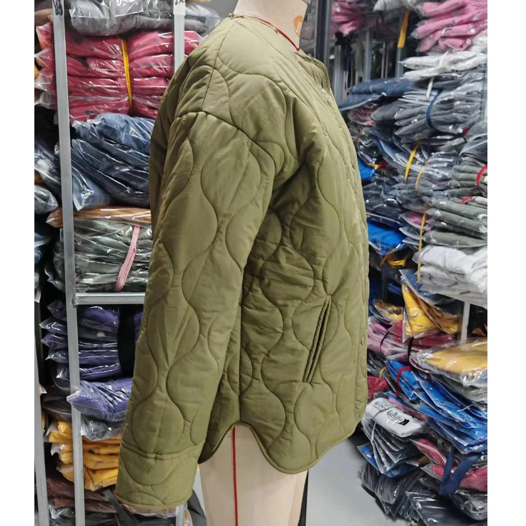 Damska pikowana kurtka do połowy łydki na jesień-zimę 2026, minimalistyczny gładki płaszcz z okrągłym dekoltem, lekko pikowany, luźny krój, casualowa odzież wierzchnia