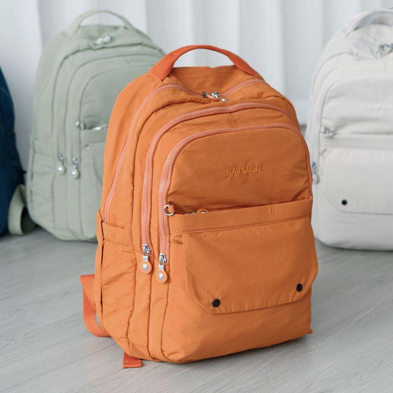 

2025 New Arrival Large Capacity Backpack 16-Inch Multi-Layer Computer Backpack Fashion Commuter Pannier Bag Waterproof Cloth Bag Amber Orange