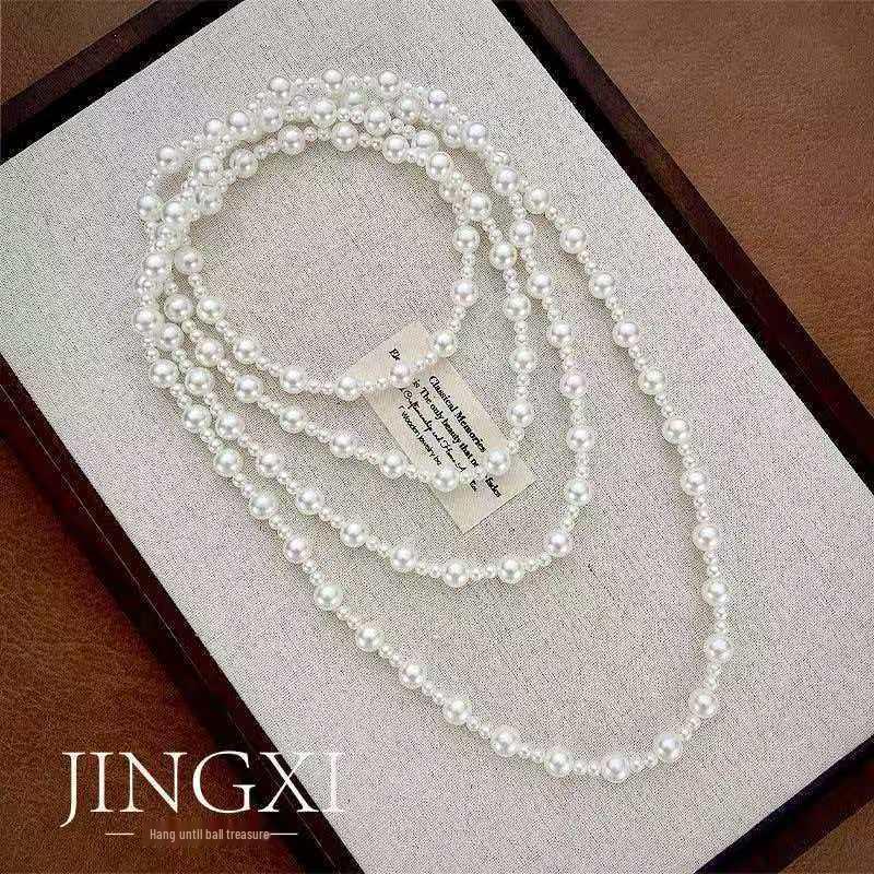 Versatile Multi-Layer Pearl Sweater Chain - Elegant and Fashionable Design