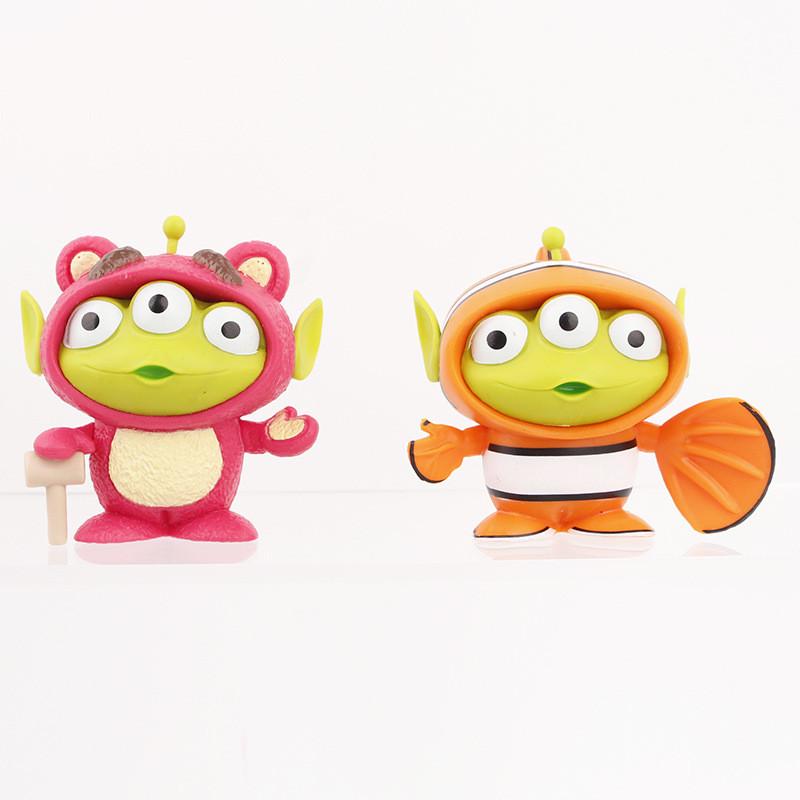 Adorable Three-eyed Alien Figurine In Various Character Costumes Fun Collectible