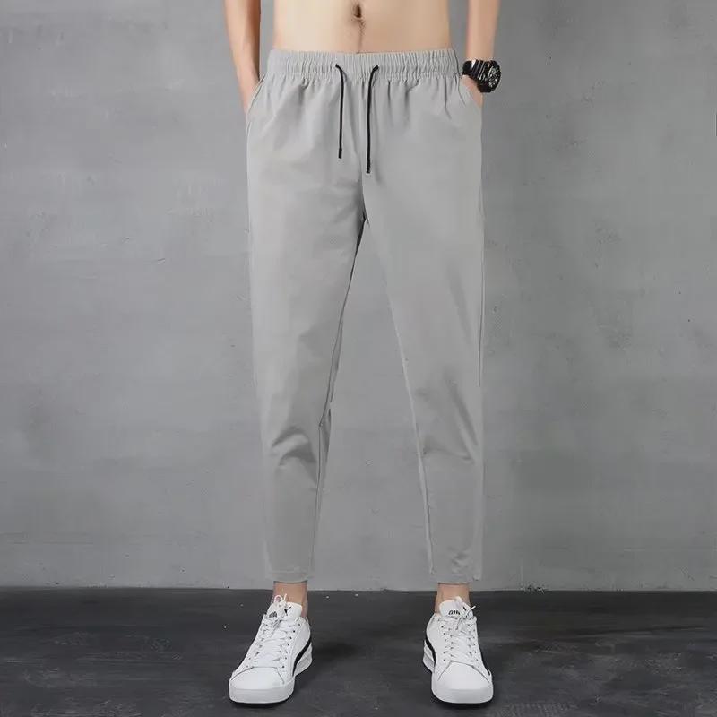 Atmungsaktive Stretch-Sporthose aus Eisseidennetz für Herren im Sommer