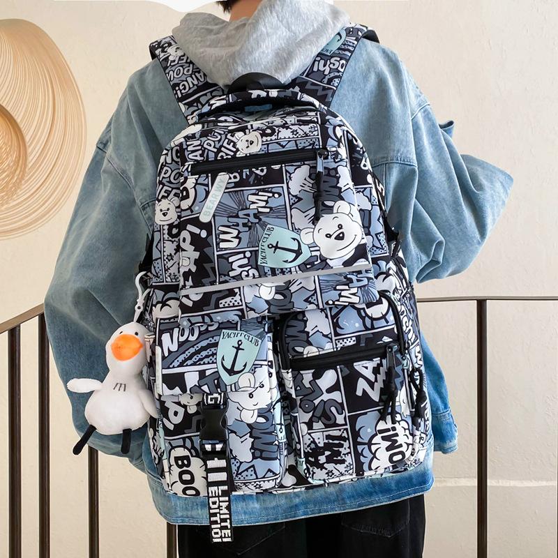 Fashion new casual backpack fashion graffiti large capacity bag female couple high school junior high school primary school bag