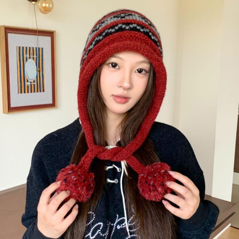 Japanese and Korean women's geometric jacquard wool hat winter windproof and cold protection ear protection lanyard sleeve hat