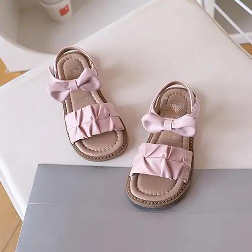 

Босоножки для девочек Детская пляжная обувь 2024 Лето Новые Новые Детские Плоские Сандалии Рюши Плиссированные с Бантом Принцесса Милые Симпатичные 26 розовый