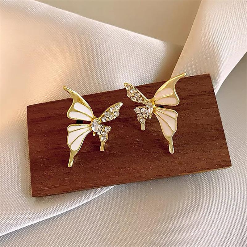 

2025 New Trend Vivid Butterfly Stud Earrings for Women Beige Enamel Crystal Women s Small Earrings Lovely Cute Ear Aceesories
