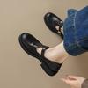Leather round head carved small leather shoes women's 2025 new commuter niche light luxury loafers medium thick heel retro single shoes