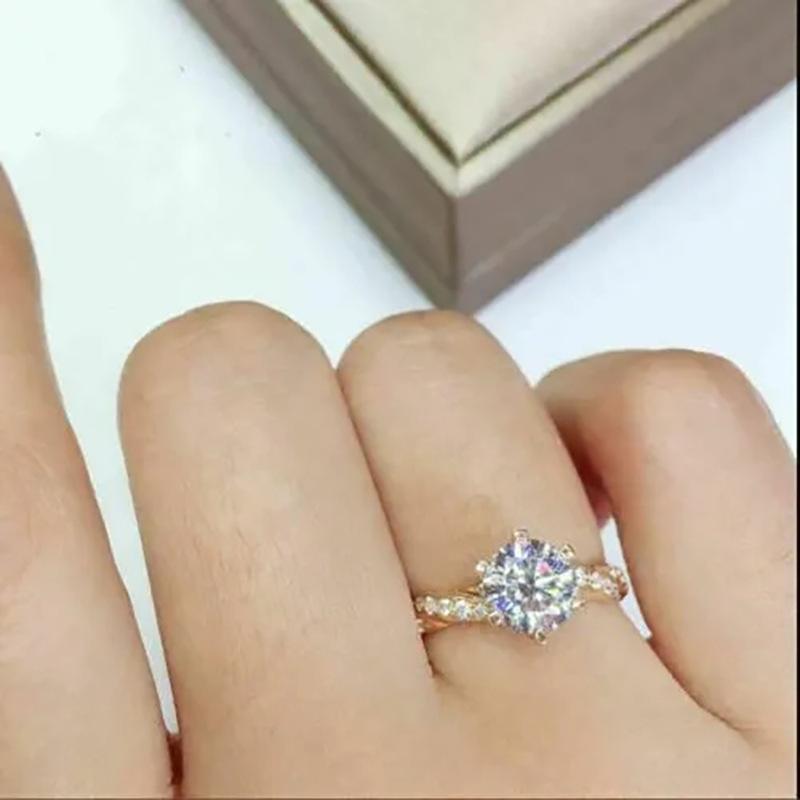 Classic European and American Round Ring Winding Twist Shape Micro-inlay Six-claw Valentine's Day Gift Qixi Gift 2026