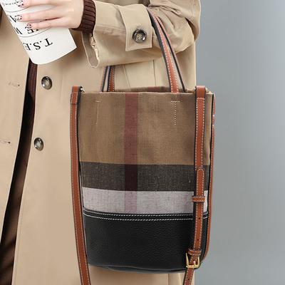 Sac seau en toile haut de gamme pour femme, sac à bandoulière en cuir de vache, nouveau style coréen à carreaux et couleurs contrastées