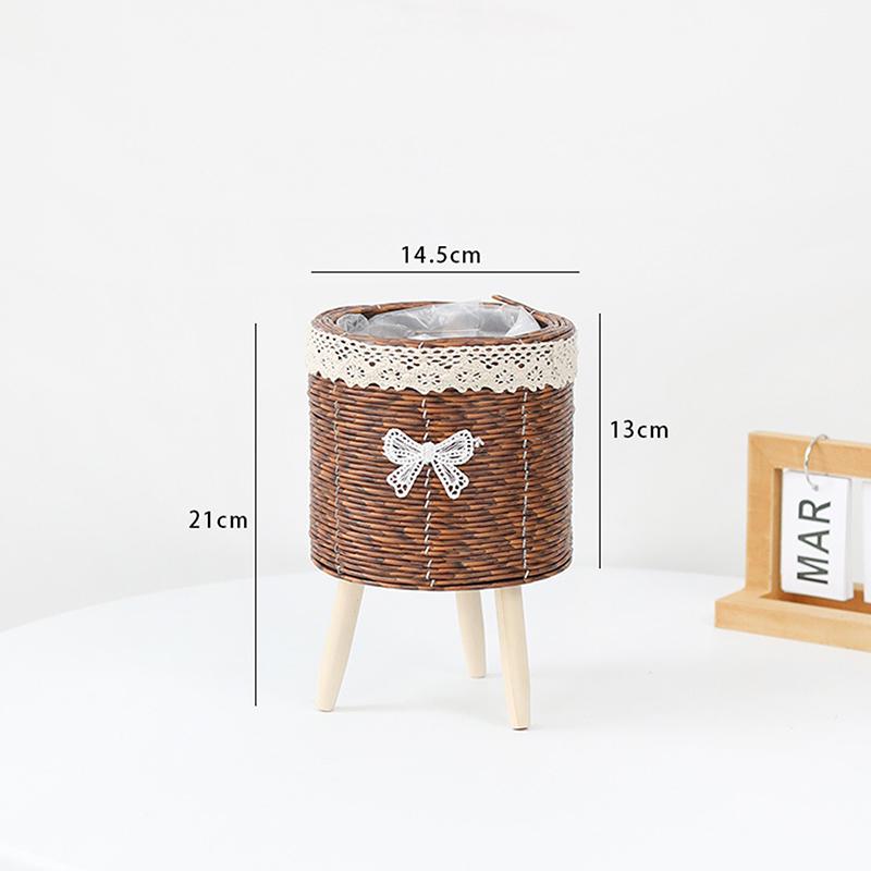 

Плетений з ротангу квітковий горщик Креативні квіткові кашпо на ніжках Міцна ручна робота Підставка для рослин Настільний квітковий горщик Кошик