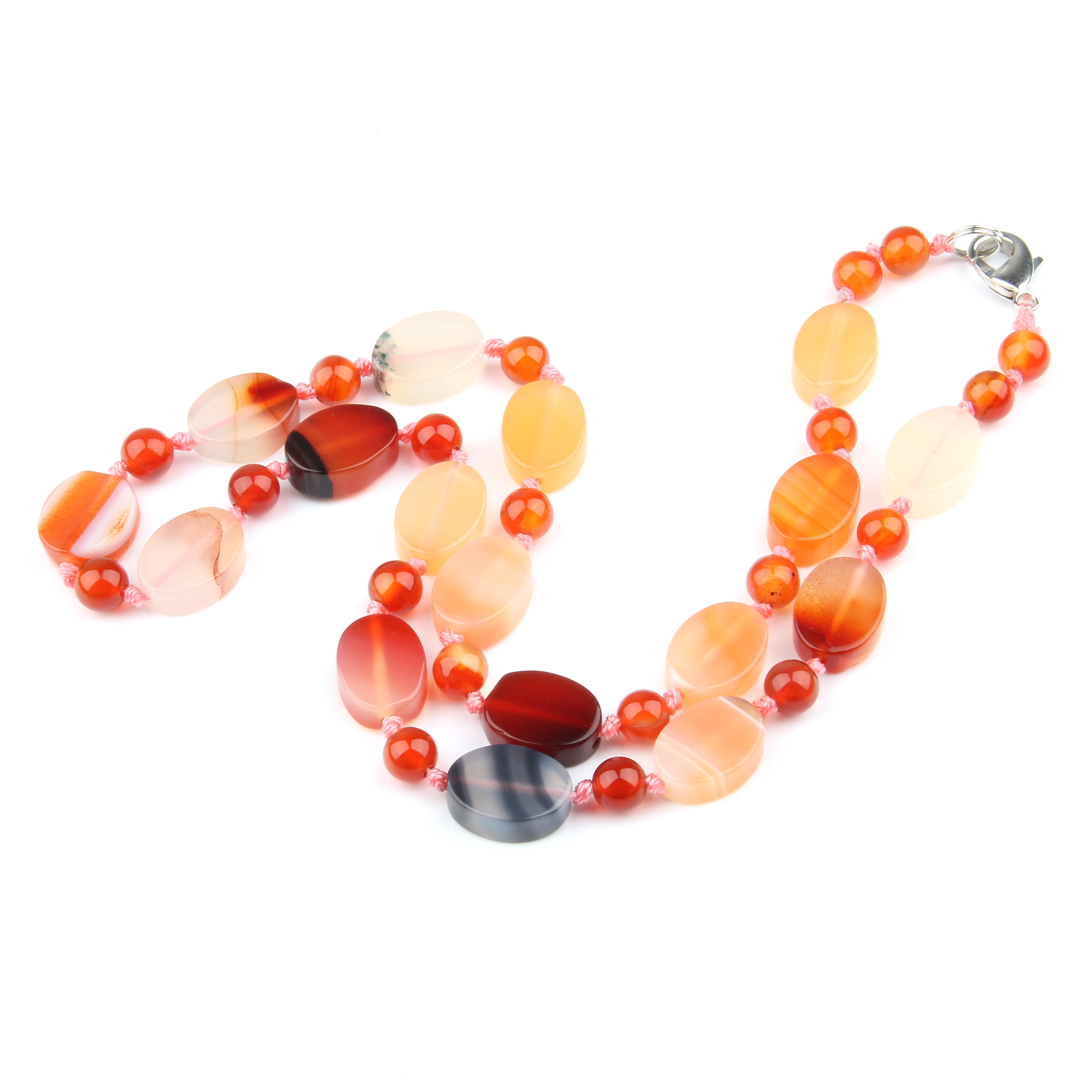 

Женские ожерелья из полудрагоценных камней