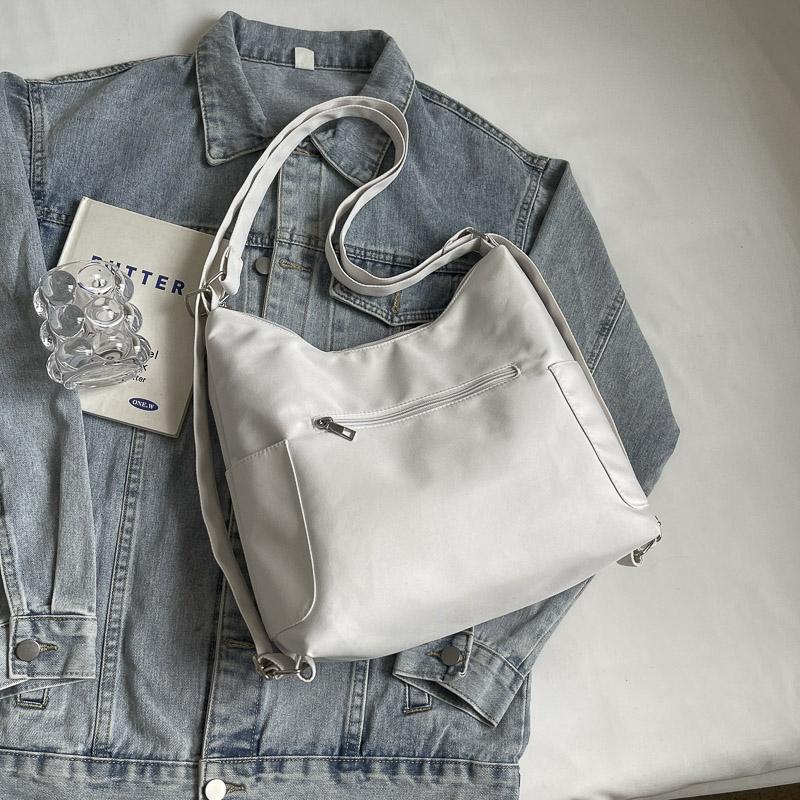 Einfarbige Tragetasche Damen-Schultertasche Große Kapazität Reise-Rucksack Umhängetasche