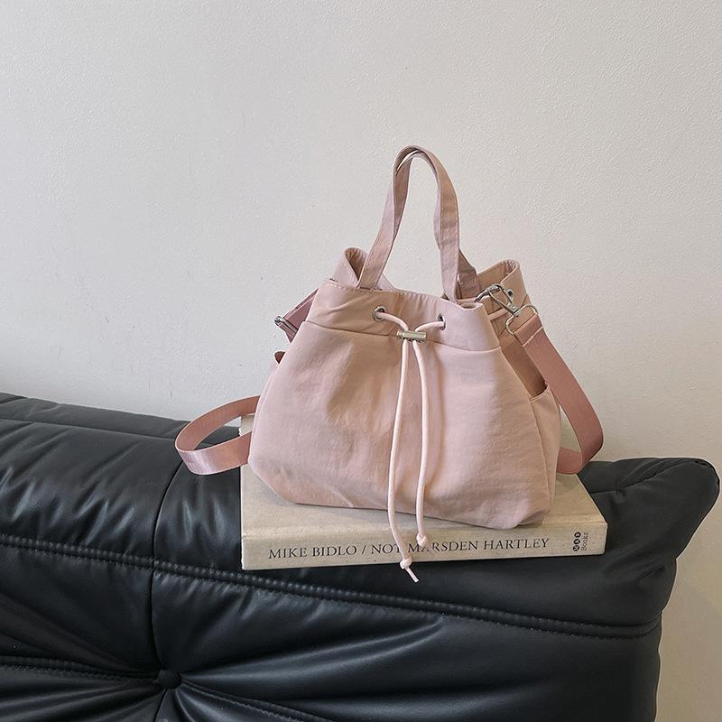 Casual Niche Drawstring Hand-held Bucket Bag Crossbody Bag for Women 2026 New Trendy Versatile Simple Small Bag Cloth Bag