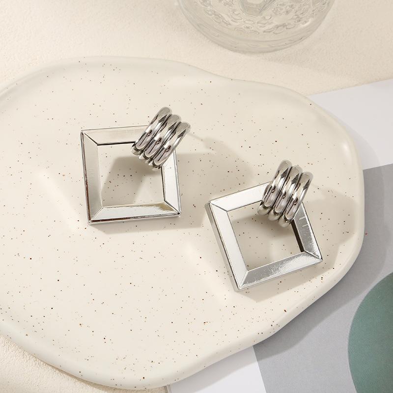 European and American jewelry simple fashion stud earrings texture double layer metal winding earrings geometric iron pipe earrings