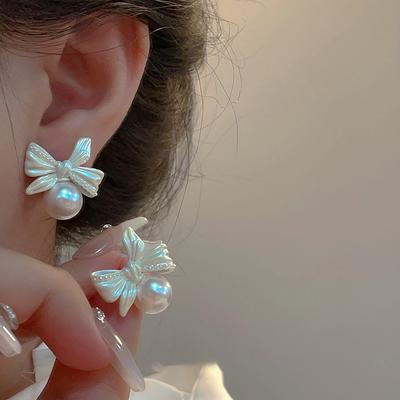 Pearl Bow Earrings, Sweet, Simple and Elegant Stud Earrings, Niche Light Luxury, High-end and Versatile Earrings.