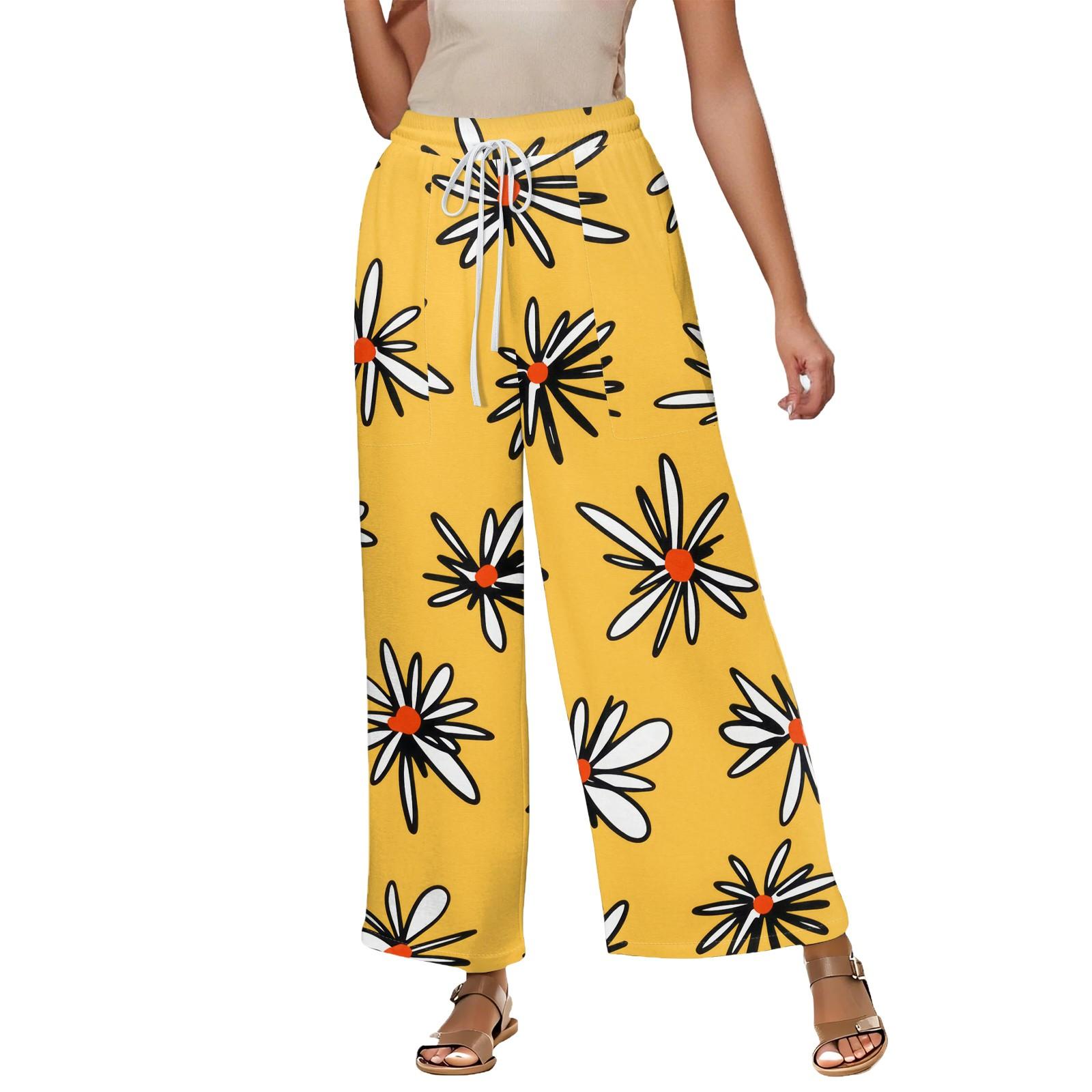 

Женские летние свободные укороченные брюки из хлопка и льна с эластичным поясом и цветочным принтом L оранжевый