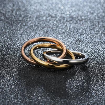Conjunto de Tres Anillos Entrelazados de Acero Inoxidable Estilo Clásico - Joyería de Moda para Mujeres y Hombres Tamaño Ajustable 5-11