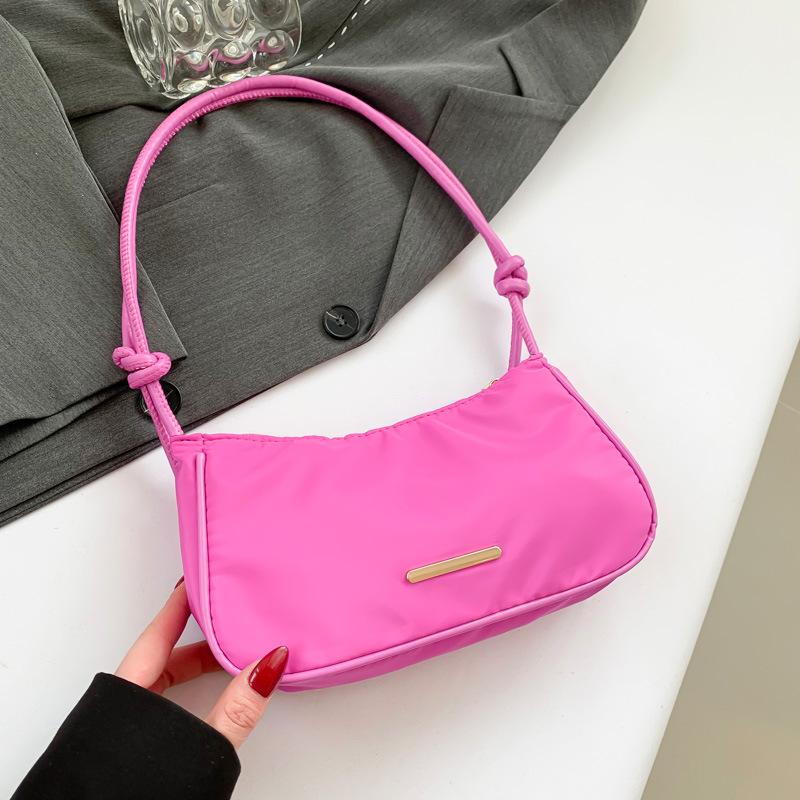 

Літо 2024, нова легка і проста невелика сумка Корейська версія сумки під пахвами Проста повсякденна жіноча сумка через плече рожевий червоний колір