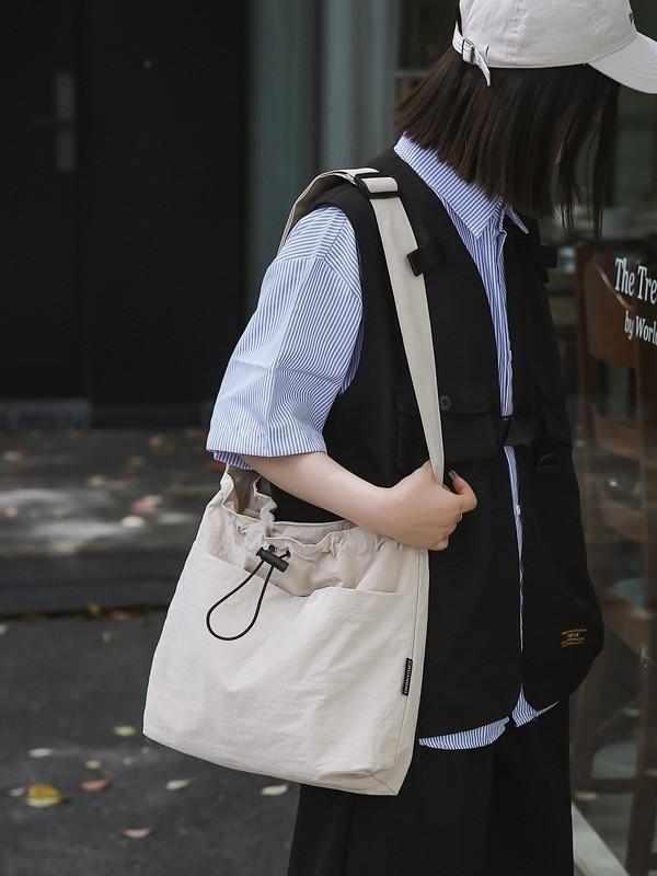 Nylon Casual Bucket Bag For Travel And Leisure With Drawstring Closure For Men And Women