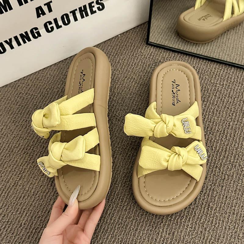 

Шлепанцы с плоской подошвой и бантом для женской летней носки 2025 новые приморские пляжные туфли с юбками ленивые сандалии на одну педаль 40 жёлтый