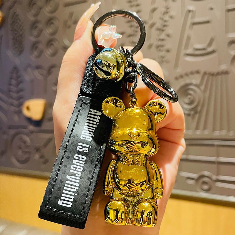 

Милий брелок з ведмедиком-метеликом, смоляний шарм, чудово підходить для бізнес- та рекламних подарунків StyleC