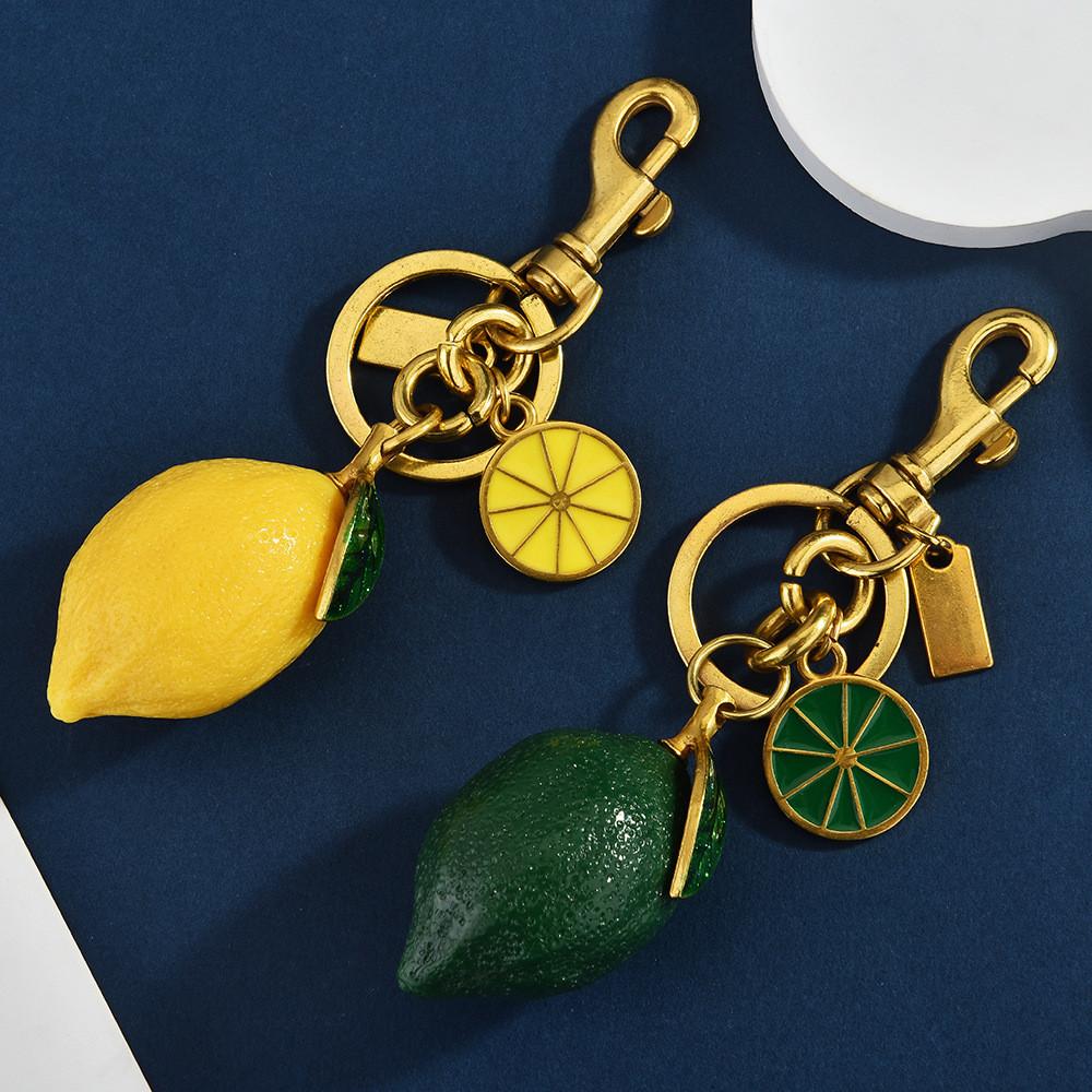 Fruit Bag Charm Key Holder With Electroplated Alloy Material And Lemon Pattern For Women