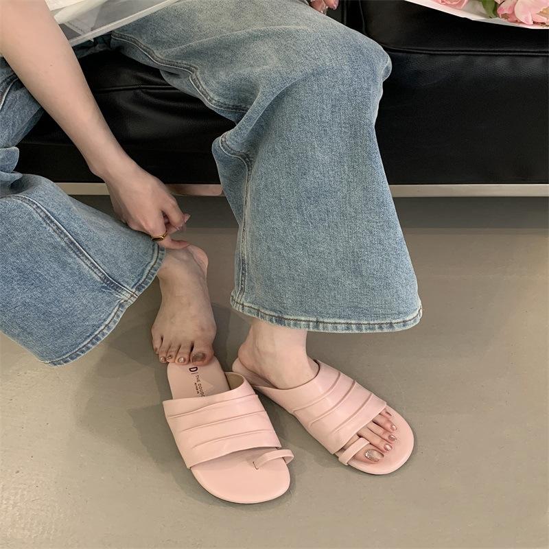 Spring and summer women's outer wear Roman women's shoes one-word seaside beach sandals design sense niche flat-bottomed pinch slippers