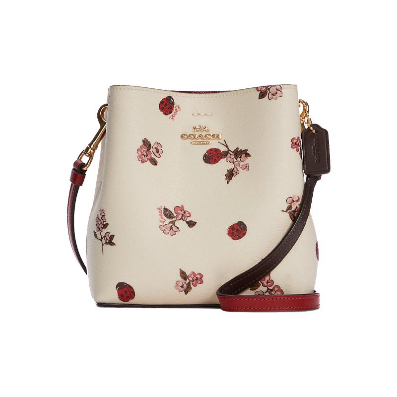 

COACH Town 16 Metal Carriage Logo Cartoon Print Coated Canvas and Smooth Leather Crossbody Bag Small Women s White золотий