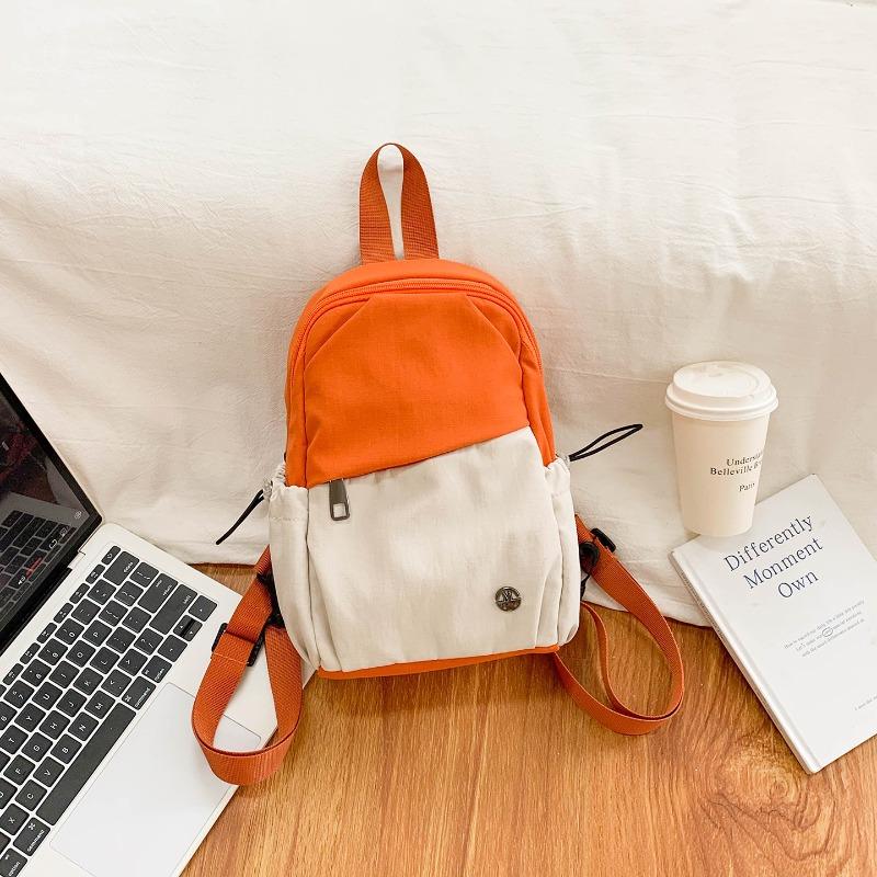 Niche design contrasting color backpack women's new lightweight fashion student bag multifunctional backpack breast bag