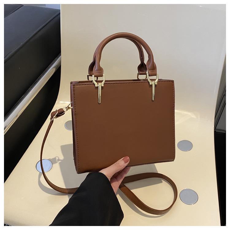 2024 Spring Women's Minimalist Crossbody Shoulder Bag - High-Quality, Fashionable, Versatile Handbag with Unique Stitching.