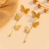 Long-flowing Tassel Butterfly Earrings for Women - Luxurious and High-end Ear Studs with Unique, Exaggerated and Grand Design.