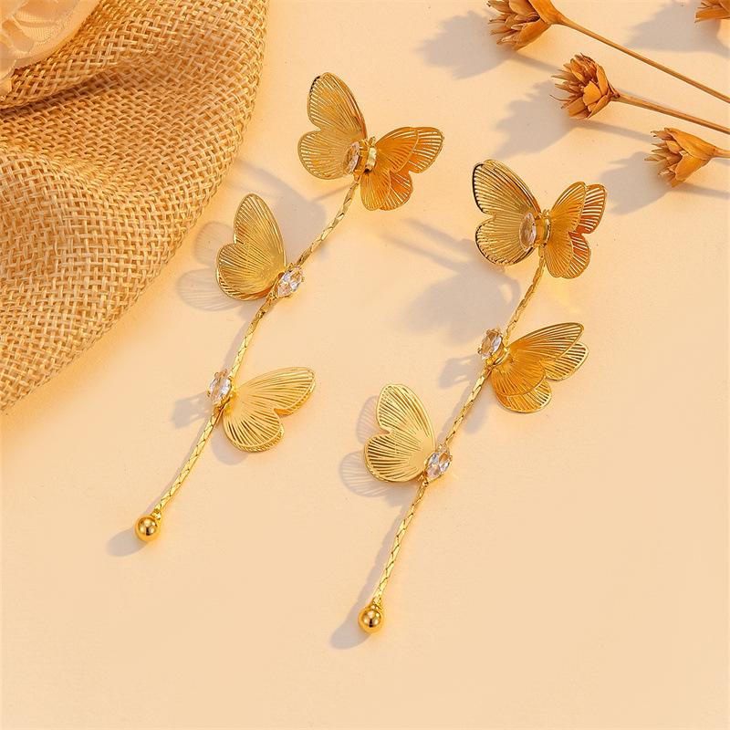Long-flowing Tassel Butterfly Earrings for Women - Luxurious and High-end Ear Studs with Unique, Exaggerated and Grand Design.