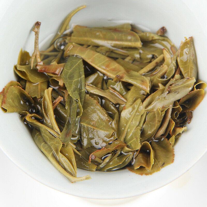 1000 г сырого зеленого чая Пуэр «Павлин» Top Kong Que Qing Zhuan Shen Puer Tea Brick 1000g — фото 5