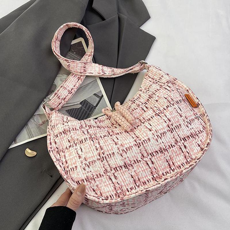 

Модна та універсальна жіноча сумка через плече великої місткості рожевий